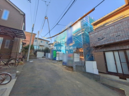 ��t���D���s�O�R1���ڂ̐V�z��ˌ��Ă̑O�ʓ��H�܂ތ��n�ʐ^